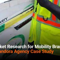 Field market researcher conducting in-person interview in Nigeria's urban mobility market