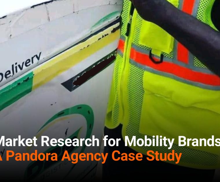 Field market researcher conducting in-person interview in Nigeria's urban mobility market